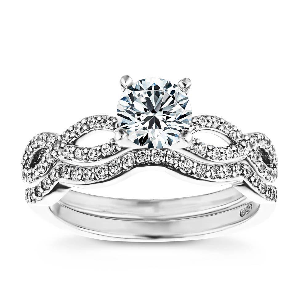 Allure Wedding Set shown with a 1.0ct Round cut Lab-Grown Diamond in recycled 14K white gold 