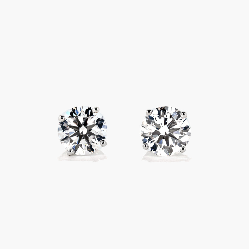 Shown in 14K White Gold|classic stud earrings featuring round cut lab grown diamonds set in white gold basket setting by MiaDonna