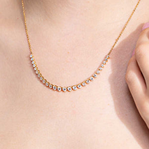 graduated mini tennis necklace with lab grown diamonds set in 14k recycled yellow gold