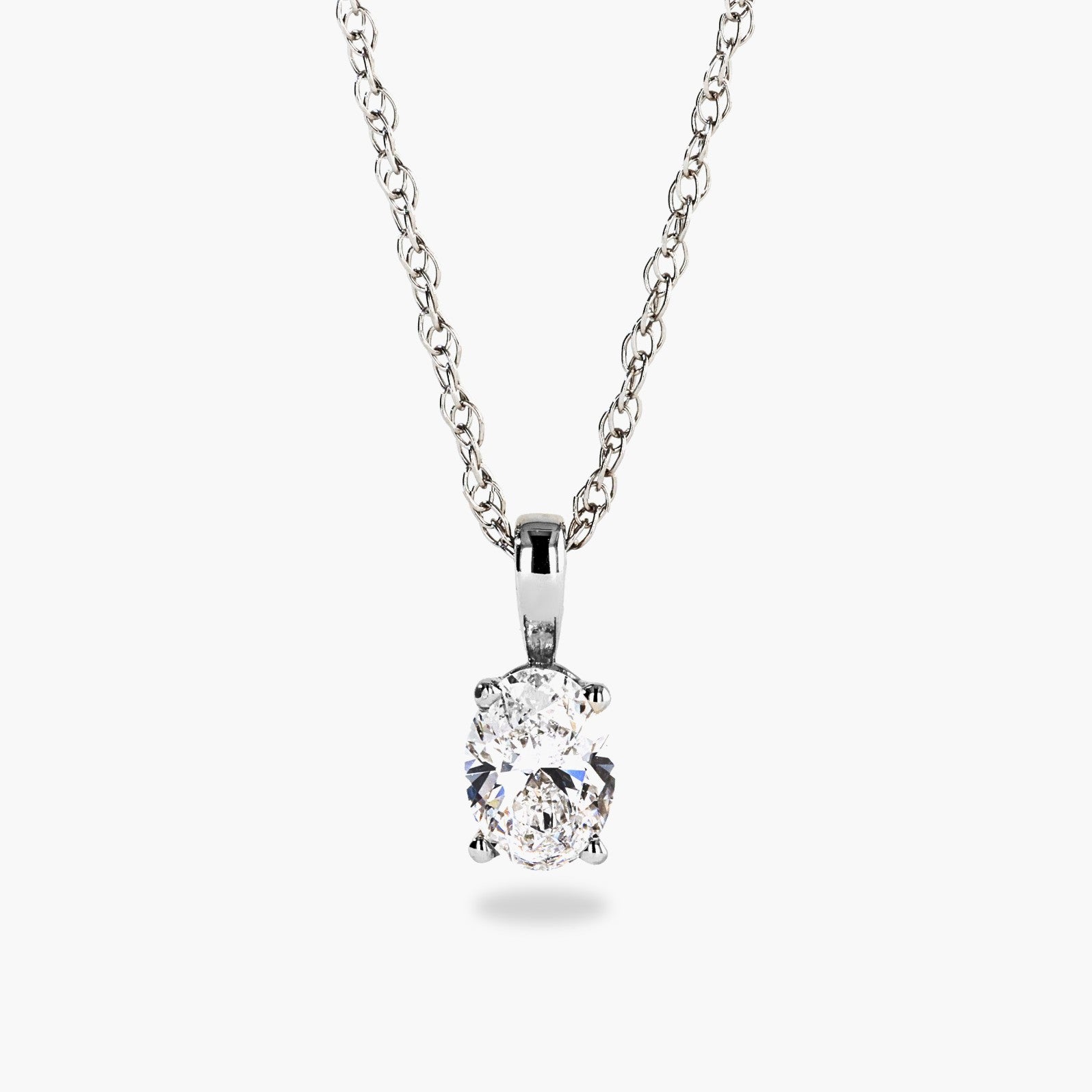 Shown in 14K White Gold|basket pendant with an oval cut lab grown diamond by MiaDonna