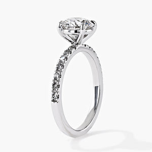 diamond accented engagement ring with round cut lab grown diamond center stone set in 14k white gold recycled metal by MiaDonna
