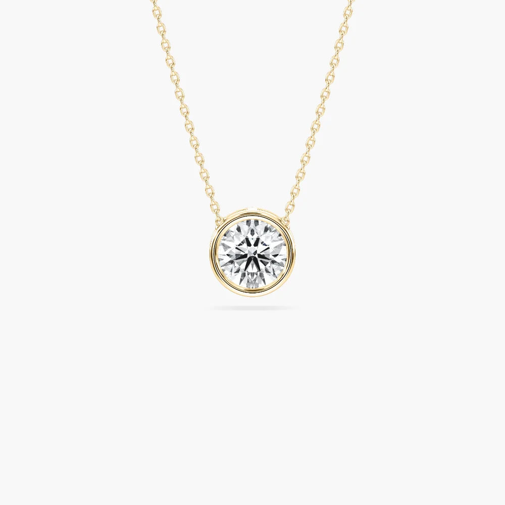 Shown In 14K Yellow Gold|bezel set pendant with a round cut lab grown diamond