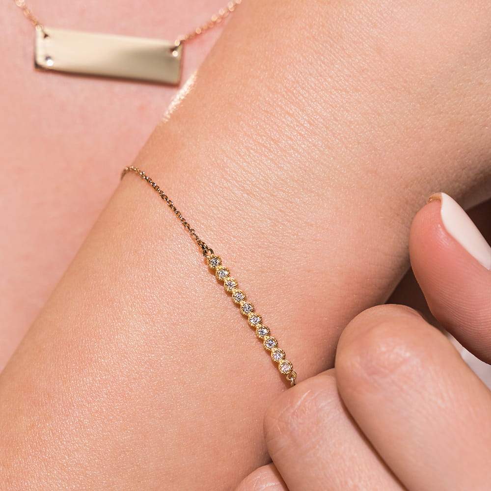 Diamond Bar Bracelet is set with 0.15ctw Lab-Grown Diamonds in a straight bar setting shown in recycled 14k yellow gold |Diamond Bar Bracelet 0.15ctw Lab-Grown Diamonds straight bar setting recycled 14k yellow gold