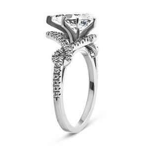  two tone wedding set Shown with a 1.0ct Pear cut Lab-Grown Diamond with a diamond accented halo and twisted detail band in recycled 14K white gold with matching wedding band, can be purchased together for a discounted price