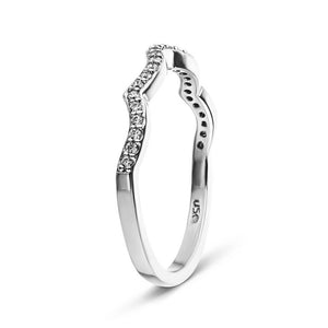 Unique wavy diamond accented wedding band in 14k white gold shown from side