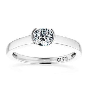 Sleek modern solitaire engagement ring with 1ct round cut lab grown diamond in 14k white gold