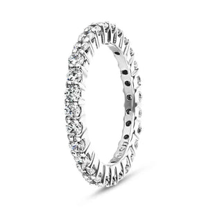 Arctic anniversary 1ctw diamond eternity band made with recycled diamonds and 14k white gold shown from side