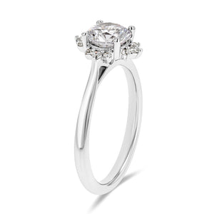 diamond halo engagement ring with a round cut lab grown diamond center stone set in 14k white gold metal