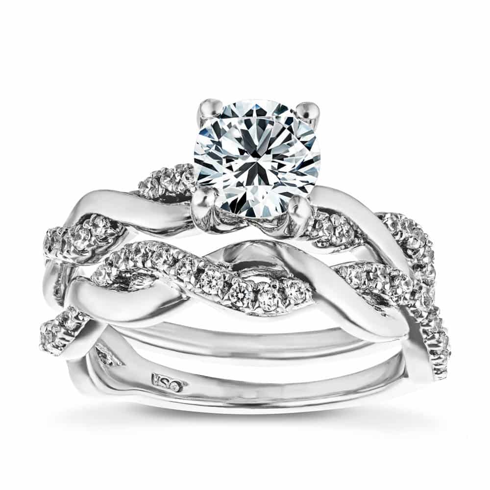 Matching Wedding Set shown with a 1.0ct round cut Lab-Grown Diamond with accenting stones in recycled 14K white gold | diamond accented engagement ring and matching wedding band Shown with a 1.0ct round cut Lab-Grown Diamond with accenting stones in recycled 14K white gold