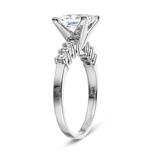 Accented engagement ring with round cut lab ground diamond accents and a 2ct princess cut lab grown diamond in 14k white gold shown from side