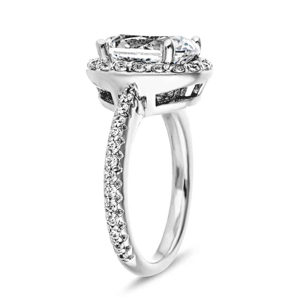 Shown with 2ct Oval Cut Lab Grown Diamond in 14k White Gold|Oval diamond halo engagement ring with accented band set with 2ct lab grown diamond in 14k white gold