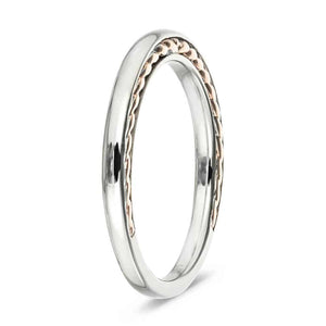 Unique ethical wedding band with a twisted metal design inlay in two tone 14k white gold and rose gold shown from side