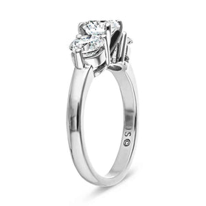 Three stone engagement with round cut lab grown diamonds in 14k white gold shown from side