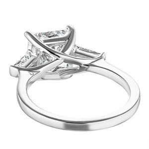 Beautiful three stone engagement ring with trellis set 2.5ct princess cut lab grown diamond amid baguette side stones in 14k white gold shown shown from back