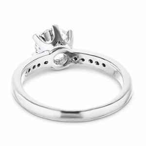Six prong diamond accented engagement ring in 14k white gold shown from behind