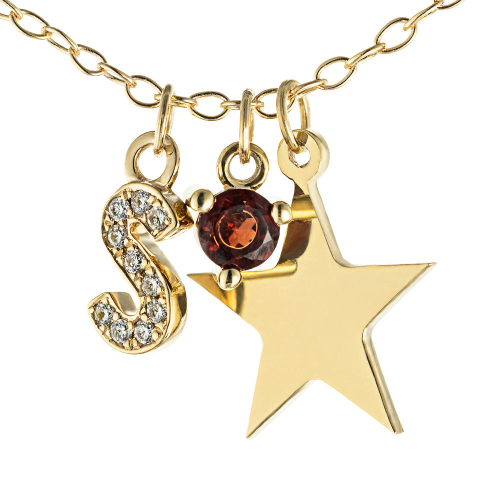 Charm Necklace feat: Accented &quot;S&quot;, Star Charm , &amp; Garnet Birthstone in 14K yellow gold 