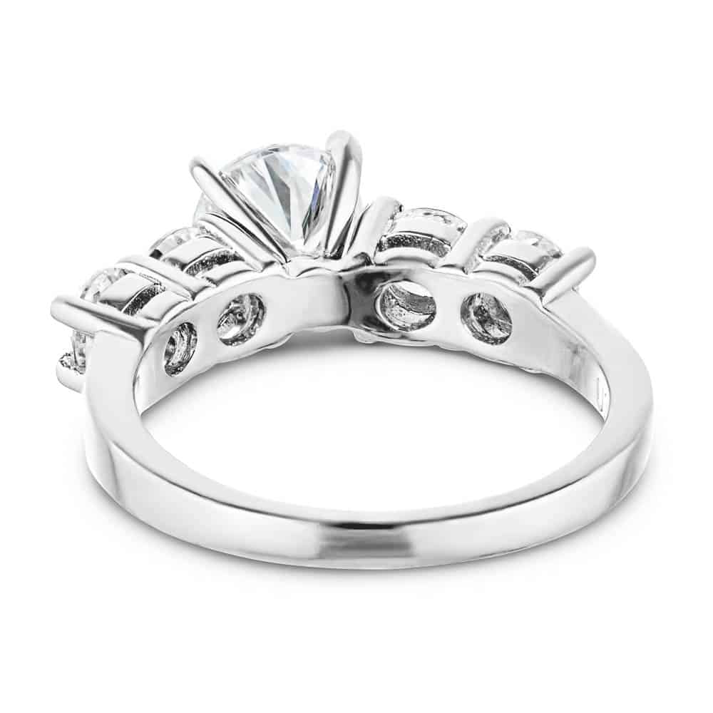 Shown with a 1ct Round Cut Lab Grown Diamond Center Stone amid four 0.25ct Diamond Hybrids in 14k White Gold