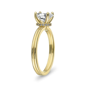 Gorgeous hidden halo engagement ring with 1.5ct oval cut lab grown diamond in 14k yellow gold shown from side