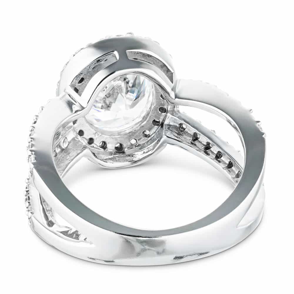 Shown with a 1.0ct Round cut Lab-Grown Diamond with diamond accented halo and split shank in recycled 14K white gold with matching wedding band| diamond accented engagement ring Shown with a 1.0ct Round cut Lab-Grown Diamond with diamond accented halo and split shank in recycled 14K white gold with matching wedding band