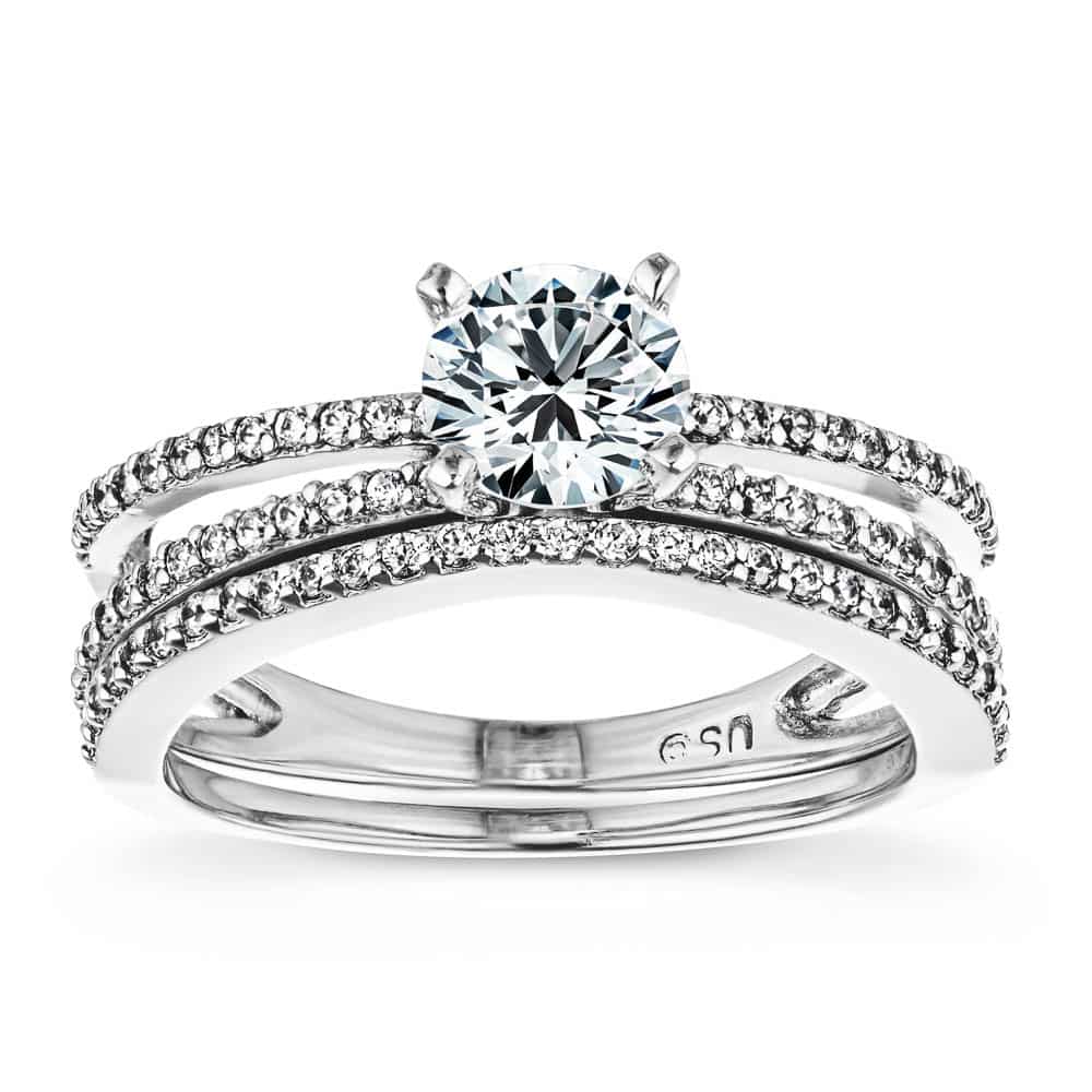 Shown with 1ct Round Cut Lab Grown Diamond set in 14k White Gold paired with Matching Wedding Band