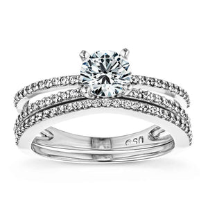 Diamond accented split shank engagement ring with 1ct round cut lab grown diamond set in 14k white gold shown with matching diamond accented wedding band