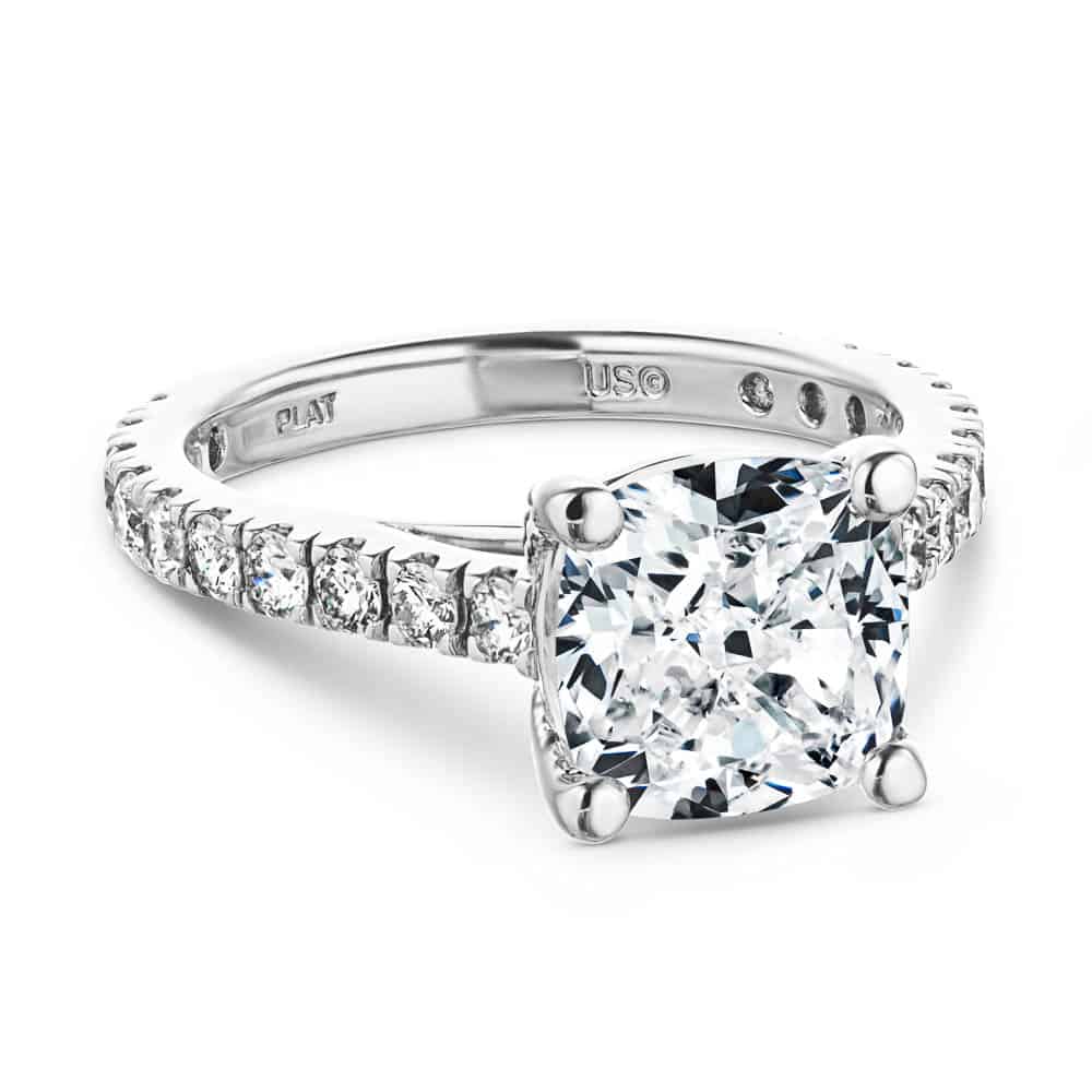 Shown with 1ct Cushion Cut Lab Grown Diamond in Platinum|Diamond accented engagement ring with 1ct cushion cut lab grown diamond set in a four prong trellis in platinum