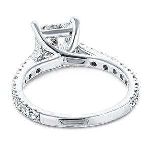 Diamond accented engagement ring with 1ct cushion cut lab grown diamond set in a four prong trellis in platinum shown from back