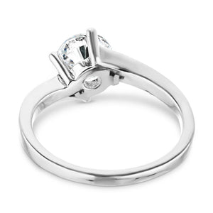 Modern simple minimalistic solitaire engagement ring with 1ct round cut lab grown diamond in 14k white gold shown from back