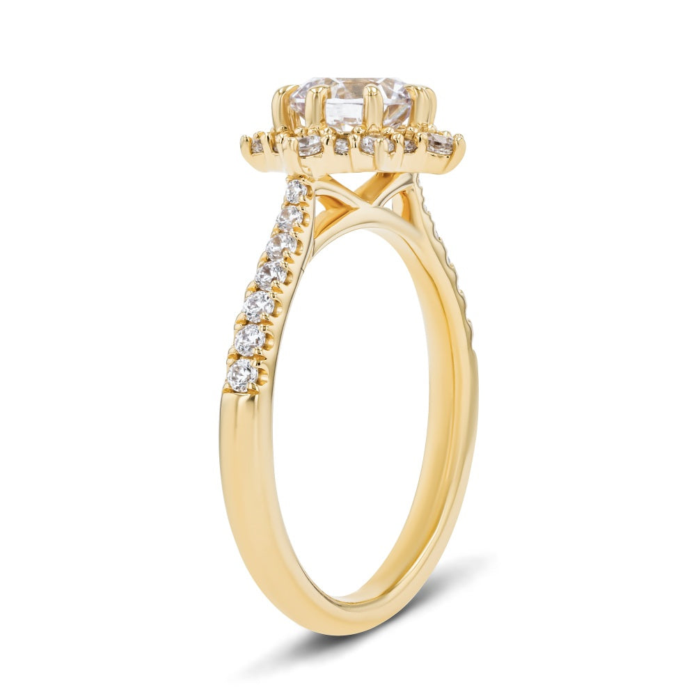 Shown here with a 1.0ct Round Cut Lab Grown Diamond center stone in 14K Yellow Gold|diamond accented halo engagement ring with round cut lab grown diamond center stone set in 14k yellow gold recycled metal
