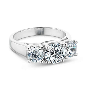 Elegant three stone engagement ring with round cut lab grown diamonds in 14k white gold