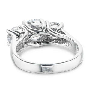 Three stone engagement ring with round cut lab grown diamonds in 14k white gold trellis style basket shown from back