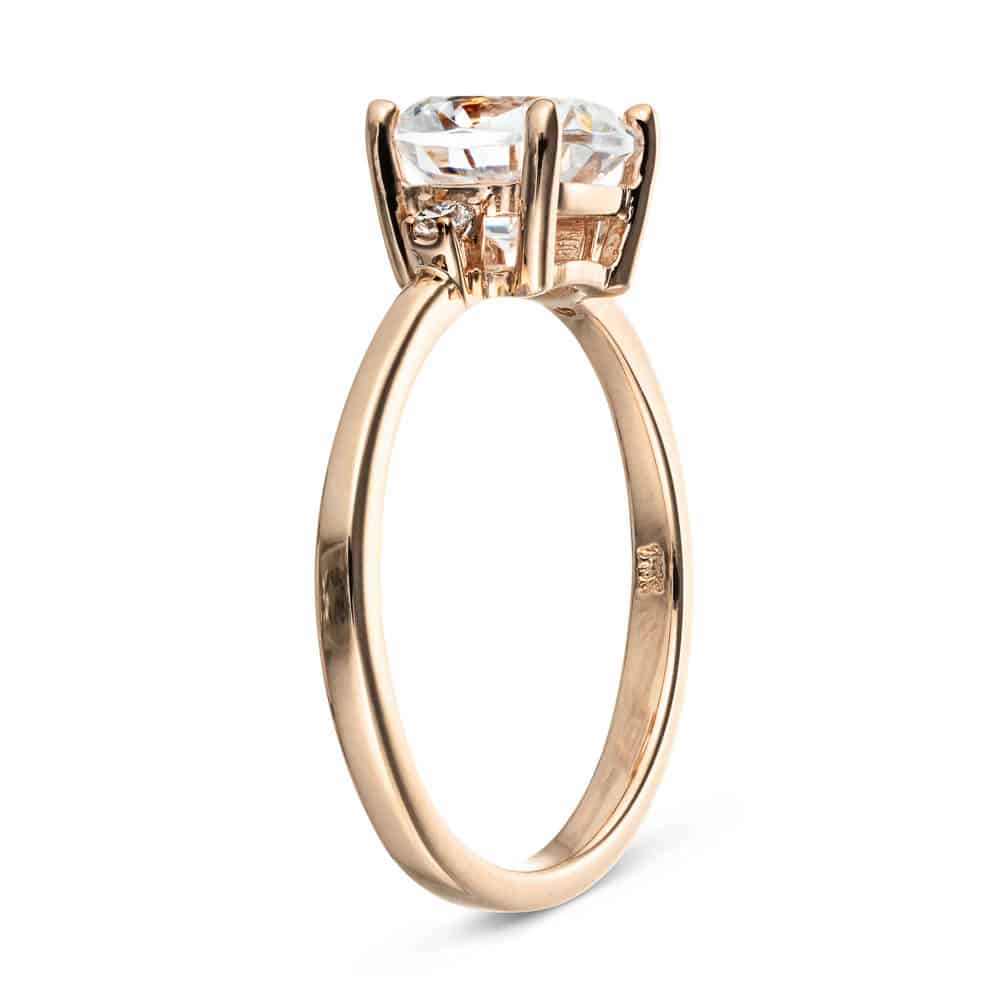 Shown with 1ct Cushion Cut Lab Grown Diamond in 14k Rose Gold|Ethical engagement ring with 1ct cushion cut lab grown diamond with two diamond side stones in 14k rose gold