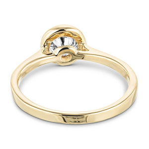 Modern engagement ring with 1ct round cut bezel set lab grown diamond in 14k yellow gold shown from back