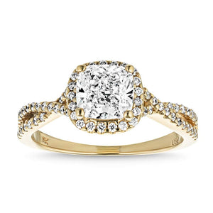 Beautiful diamond halo engagement ring with crossover split shank band set with 1ct cushion cut lab grown diamond in 14k yellow gold
