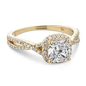 Luxury fashion ring with accented diamond halo and split shank band set with 1ct cushion cut lab grown diamond in 14k yellow gold