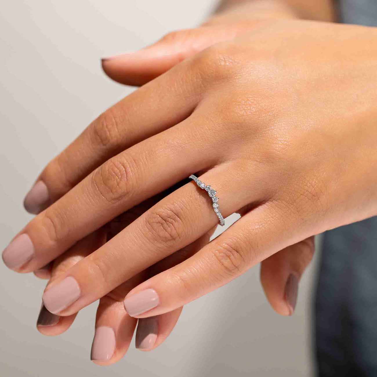 Everly Accented Wedding Band Shown in 14K White Gold|everly lab grown diamond accented contour band shown in 14k white gold metal