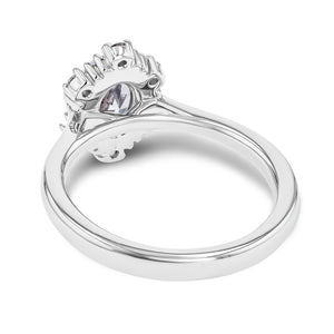 halo engagement ring with a carat oval cut lab grown diamond center stone set in 14k white gold metal