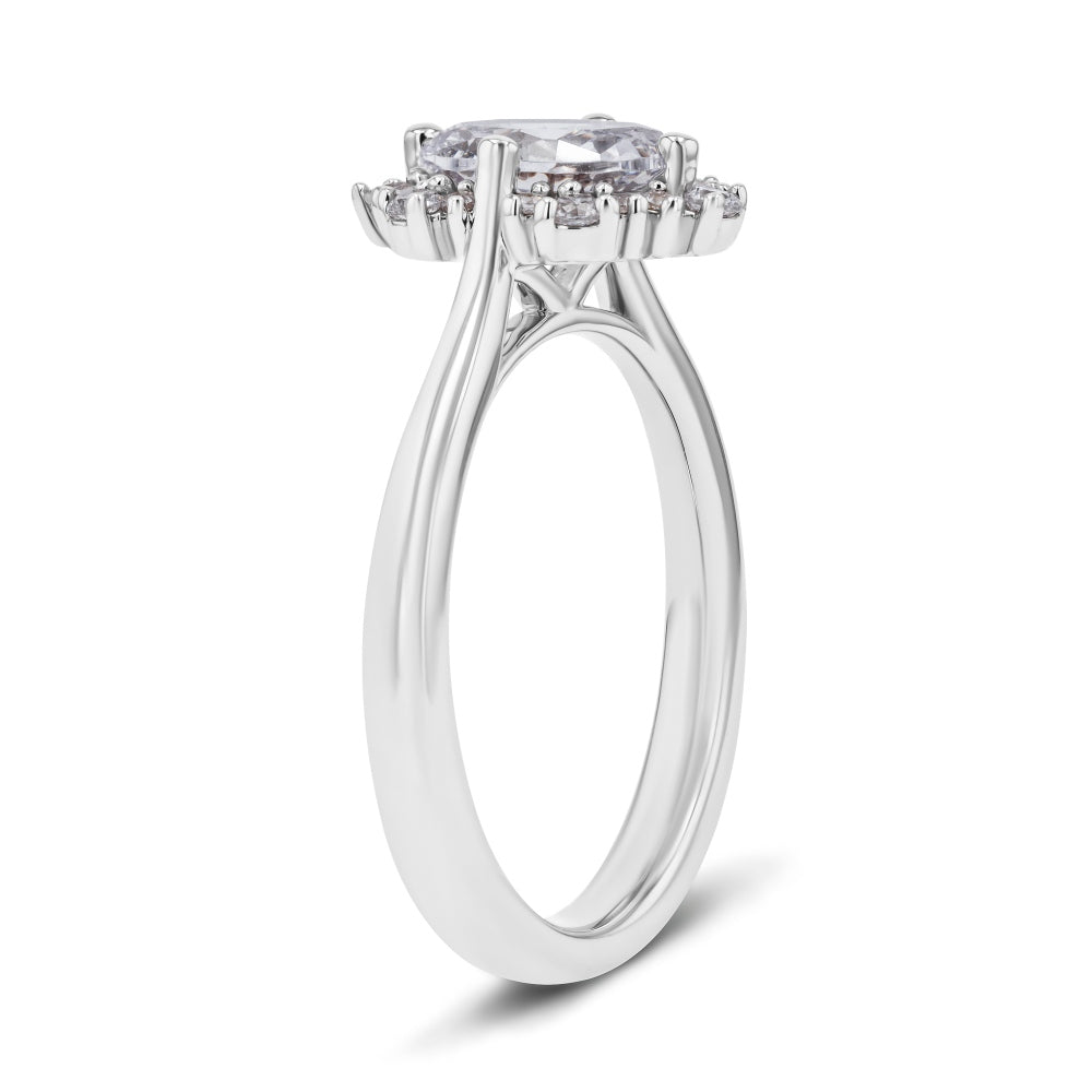 Shown here with a 1.0ct Oval Cut Lab Grown Diamond center stone in 14K White Gold|halo engagement ring with a carat oval cut lab grown diamond center stone set in 14k white gold metal