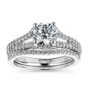  diamond accented wedding set Shown with a 1.0ct Round cut Lab-Grown Diamond with diamond accented split shank and matching wedding band in recycled 14K white gold