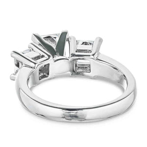 Three stone engagement ring with princess cut lab grown diamonds set in 14k white gold shown from back