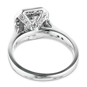 Antique style accented halo engagement ring with 1ct emerald cut lab grown diamond and peek-a-boo diamonds in 14k white gold shown from back