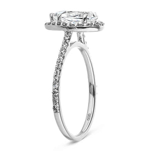 Diamond accented halo engagement ring with 1ct pear cut lab grown diamond in 14k white gold shown from side