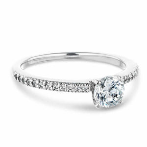Classic diamond accented solitaire engagement ring with 4 prong set round cut lab grown diamond in 14k white gold
