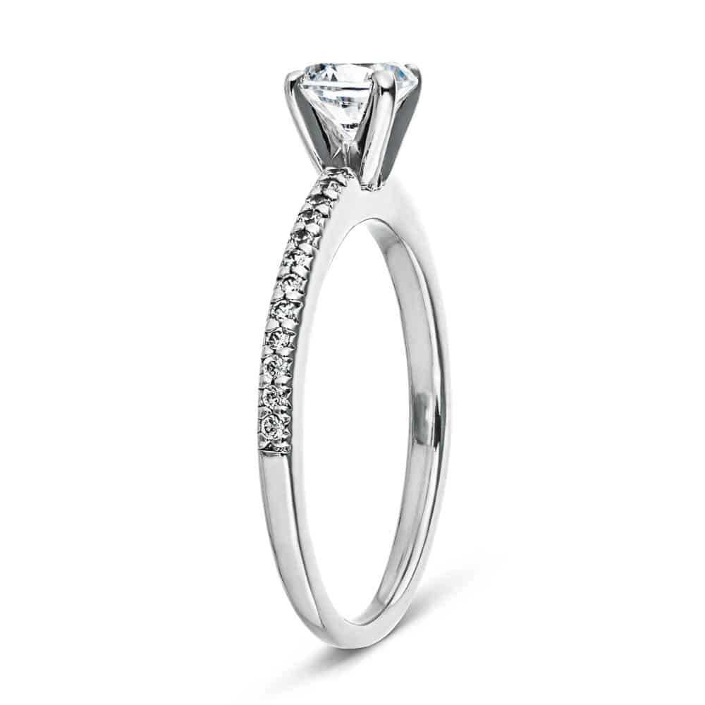 Shown with 0.70ct Round Cut Lab Grown Diamond in 14k White Gold|Classic diamond accented solitaire engagement ring with 4 prong set round cut lab grown diamond in 14k white gold