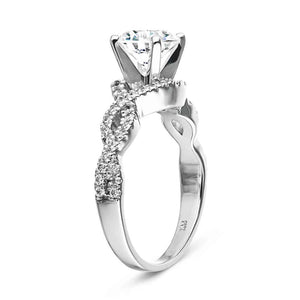 Unique diamond accented wavy band design engagement ring in 14k white gold shown from side