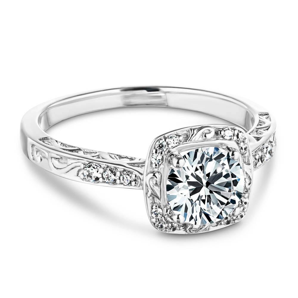 Shown with 1ct Round Cut Lab Grown Diamond in 14k White Gold|Antique style engagement ring with diamond accents and filigree detailing on the halo and band featuring 1ct round cut lab grown diamond in 14k white gold