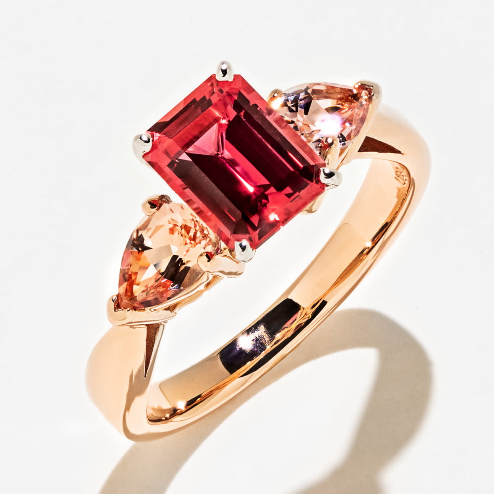 Shown with 1.5ct Emerald Cut Lab Grown Ruby with 1ct Pear Cut Lab Grown Diamonds in 14k Rose Gold