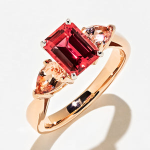 Beautiful three stone ruby engagement ring with 1ct pear cut lab grown diamond side stones set in 14k rose gold