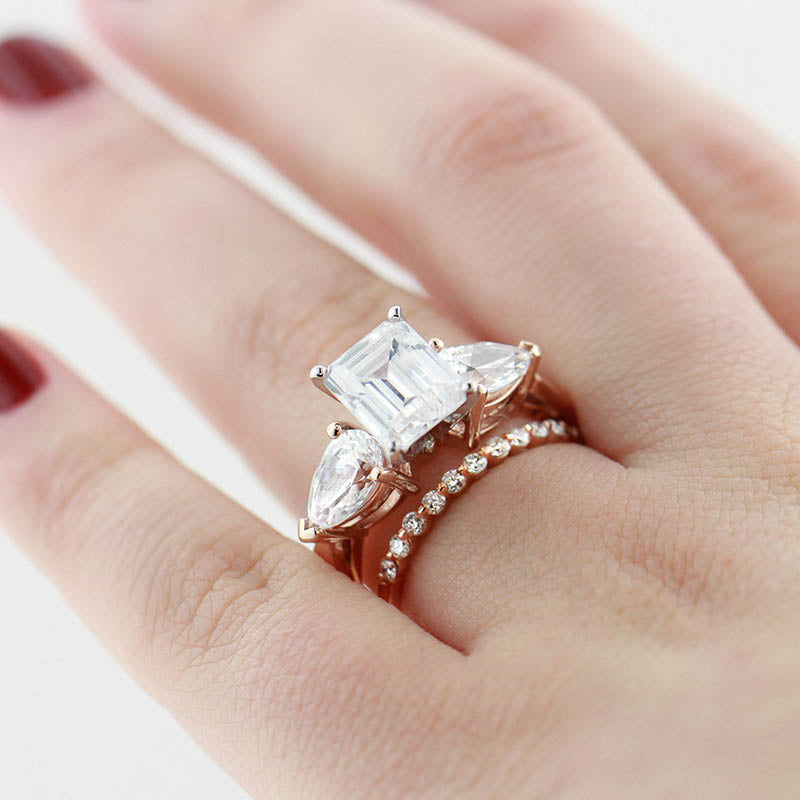 Shown with Emerald Cut and Pear Cut Diamond Hybrid Simulants in 14k Rose Gold