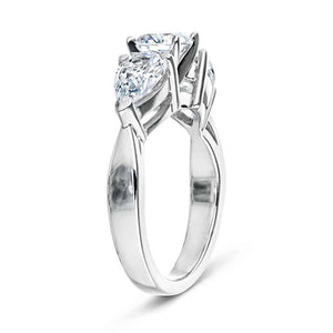 Unique three stone engagement ring with lab grown diamonds in 14k white gold shown from side